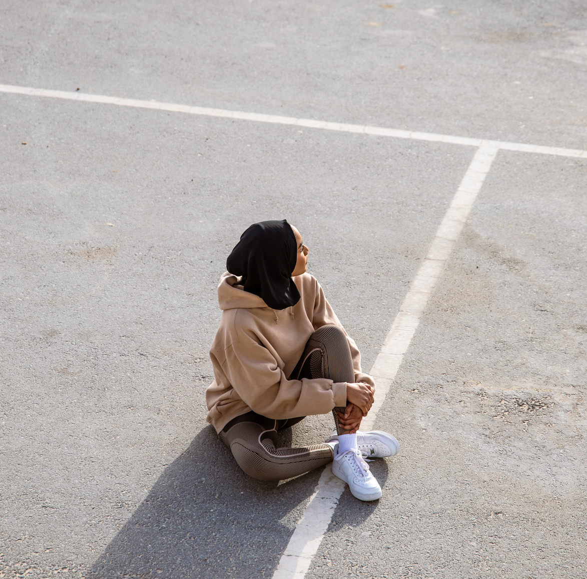 Hijabi Woman in Activewear Outdoors